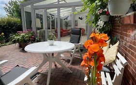 Ferienwohnung mit WINTERGARTEN in Bahnhofsnähe